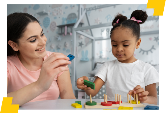 Professora brincando com aluna